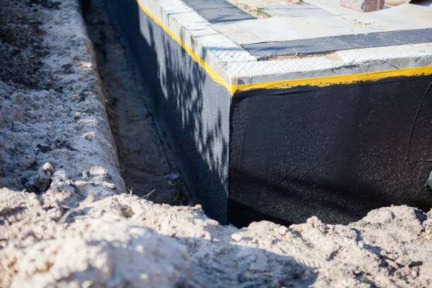 Professional Basement Waterproofing technician working in Kirkersville, OH